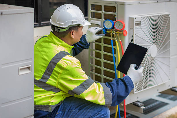Professional Air Duct Cleaning technician working in Whiteville, NC